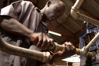 informal and formal jobs in Uganda